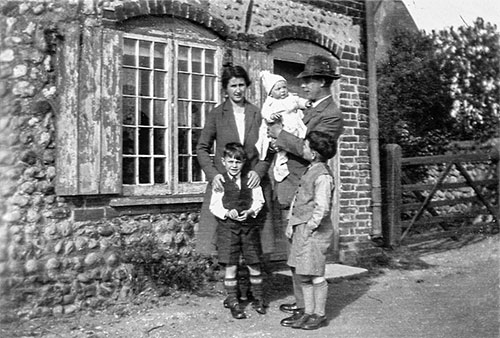 Emily & Walter Smith outside their house in Baconsthorpe